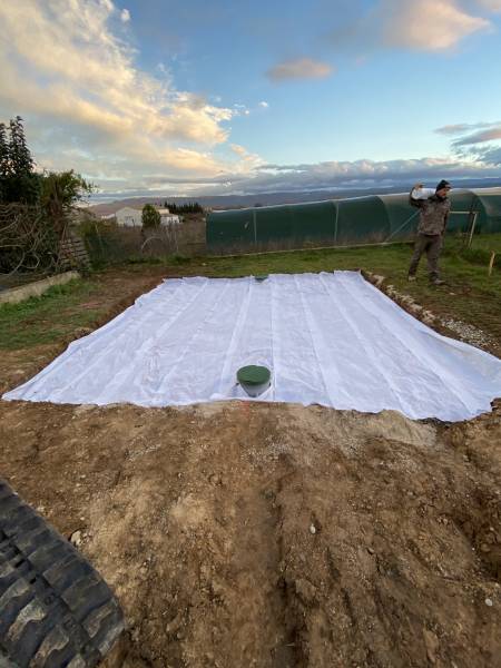 Installation d'une fosse toutes eaux avec filtre à sable de 25m2 à Maubec